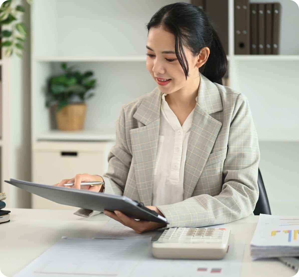 Professional businesswoman preparing financial data