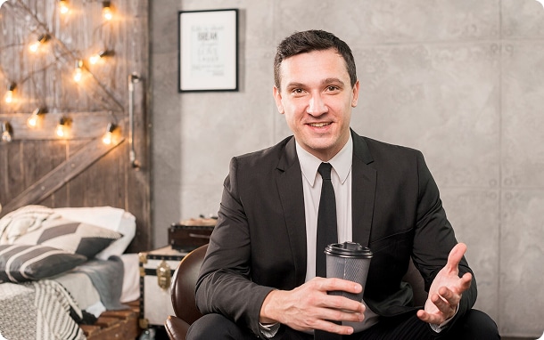 businessman sitting with cup coffee room